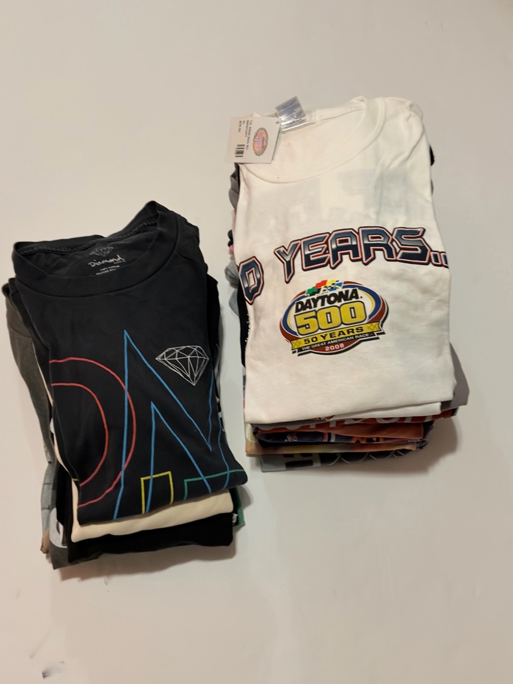 Lot of T-shirts variations of size.